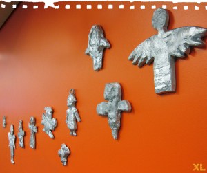 angel on wall punched